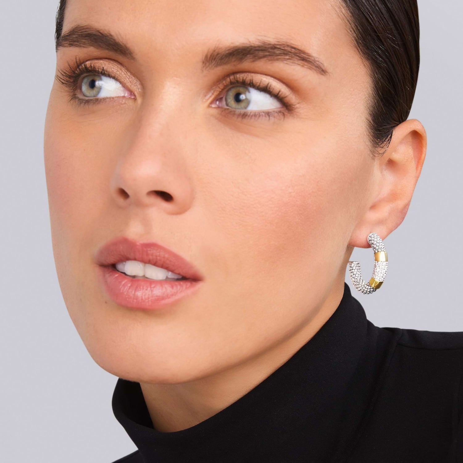 High Bar Two-Tone Diamond Hoop Earrings featuring a sleek, elongated silhouette with yellow and white tones and pavé diamond accents, crafted in a modern high-bar design for refined elegance.