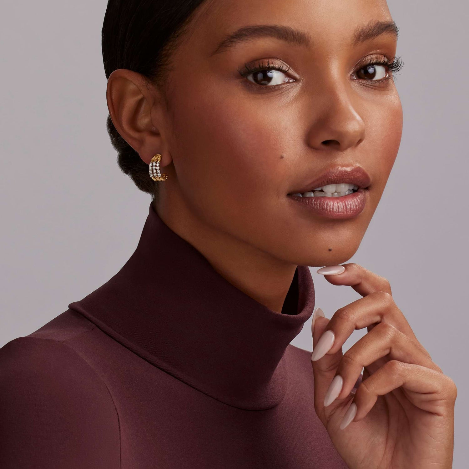 Signature Caviar Superfine Diamond Hoop Earrings with a slim, lightweight profile, featuring caviar-beaded texture and pavé diamond accents for a refined, minimalist look.